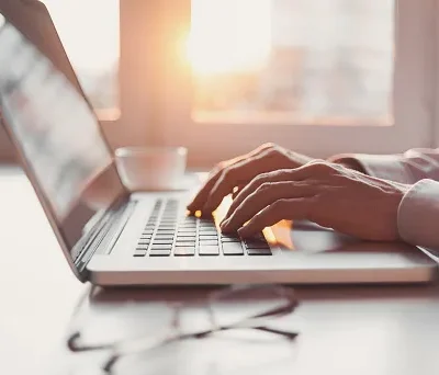 man using laptop computer